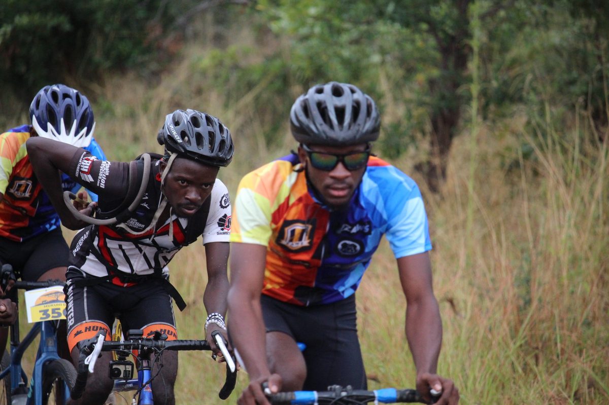 Road cyclists racing together